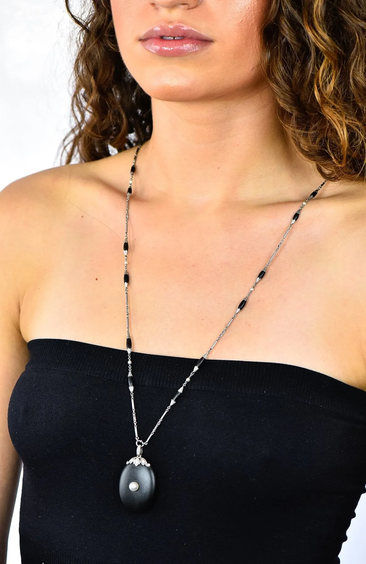 Circa 1910 Edwardian Diamond Natural Pearl Onyx Platinum Long Chain Necklace