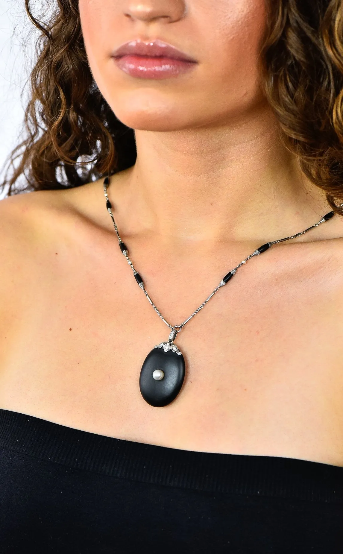 Circa 1910 Edwardian Diamond Natural Pearl Onyx Platinum Long Chain Necklace